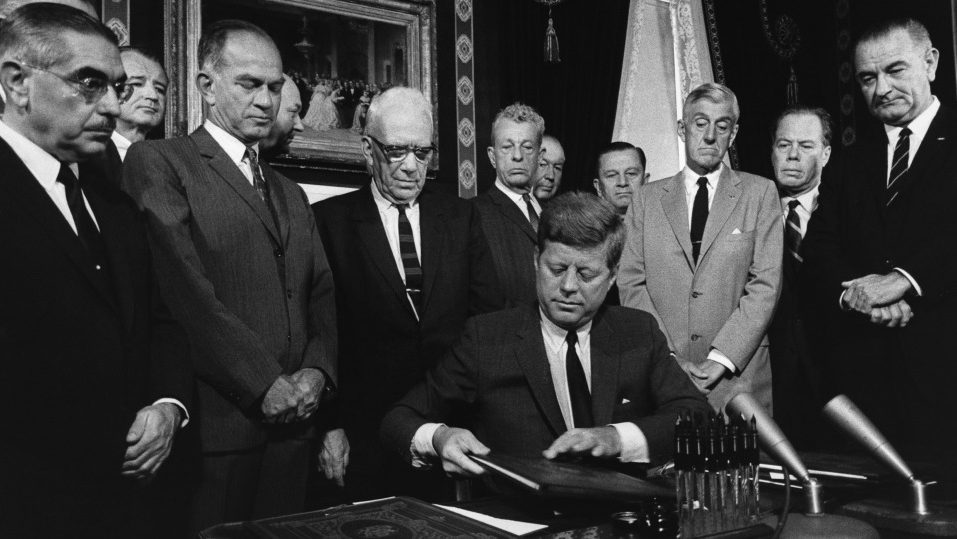 President Kennedy signing the nuclear test ban treaty